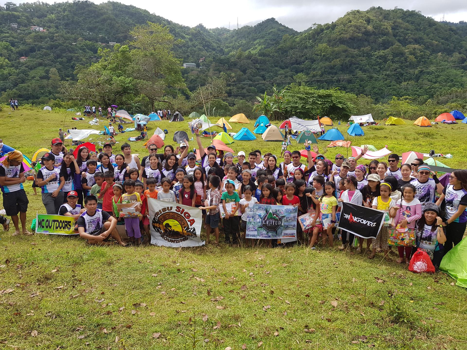 Tribu Siga and the community at a tribe gathering